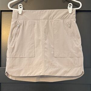 Athleta Khaki Gray Skort with Zipper Details and Built-in Briefs.